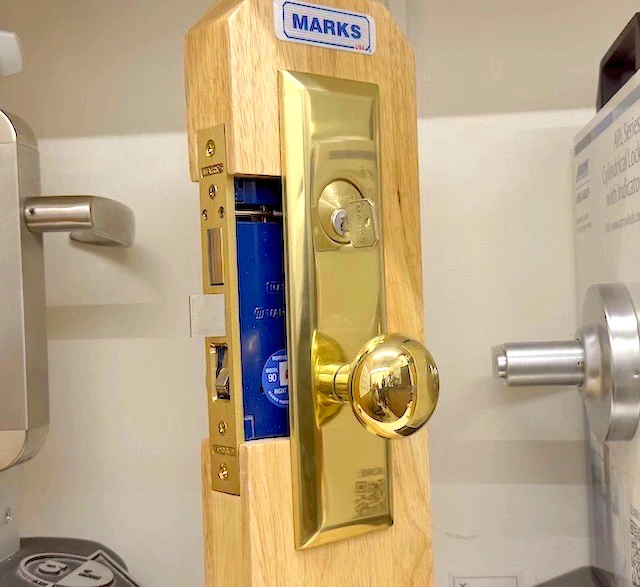 Marks USA mortise lock with brass trim displayed in-store at Aura Locksmith, Brooklyn