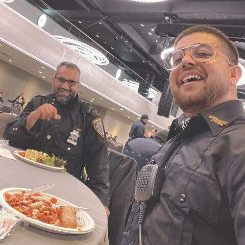 Ali Akbar with a fellow NYPD Auxiliary officer at a department event
