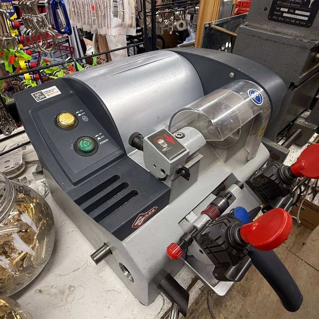 Silca key cutting machine on the counter at Aura Locksmith's Brooklyn store, used for in-store key duplication